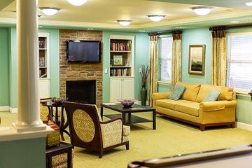 Catonsville apartment for rent - A living room with a fireplace and a couch.