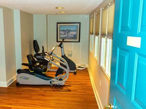 Dundalk apartment for rent - a gym room with a exercise bike in it