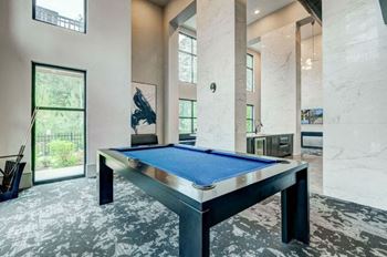 Game room with billiards table