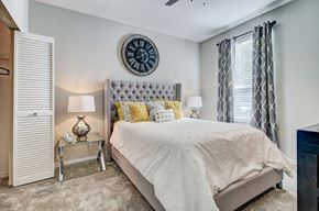 Tampa apartment for rent - Large bedroom with neutral color scheme with a closet and large windows at Tuscany Bay Apartments, Tampa, Florida