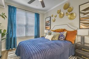 Raleigh apartment for rent - Bedroom with cozy bed at Lassiter at North Hills, North Carolina