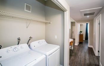 A laundry room with a washer and dryer.