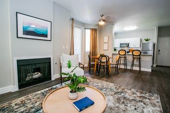 A living room with a fireplace