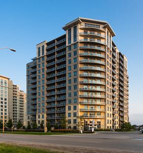 London apartment for rent - A large apartment building with balconies on each floor.