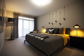 London apartment for rent - a bedroom with a large bed and a window
