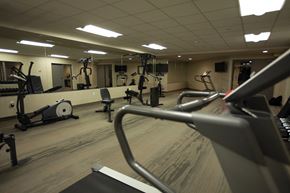 London apartment for rent - a gym with weights and other exercise equipment