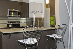 London apartment for rent - a kitchen with a counter and two chairs