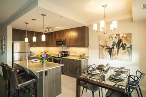 London apartment for rent - a kitchen and dining room with a table and chairs