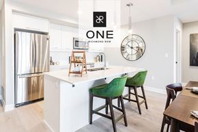 London apartment for rent - a kitchen with an island and a stainless steel refrigerator