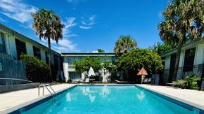 Lafayette apartment for rent - a swimming pool in front of a building
