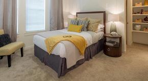 Baton Rouge apartment for rent - a bedroom with a bed and a chair