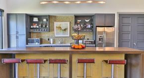 Baton Rouge apartment for rent - a kitchen with a large counter and bar stools