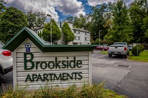 Meadville apartment for rent - a sign in front of a parking lot