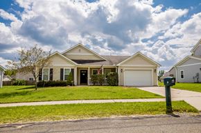 Edinboro apartment for rent - a house with a lawn and a parking meter in front of it
