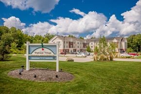 Edinboro apartment for rent - the preserve at ballantyne commons community sign with apartment buildings in the background