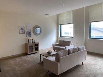 Erie apartment for rent - a living room with a couch and a coffee table