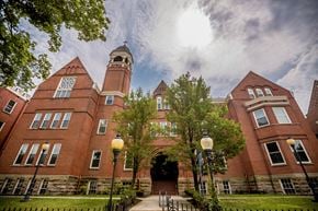 Erie apartment for rent - a large brick building with a clock tower