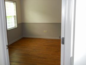 Erie apartment for rent - an empty room with wooden floors and a window