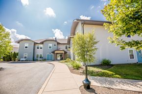 Mckean apartment for rent - the view of a building with a street in front of it