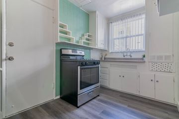Los Angeles apartment for rent - A kitchen with a stove and oven in it.