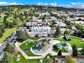Los Angeles apartment for rent - A playground with a slide and a red pin on a building.