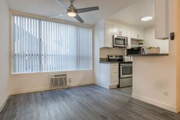 Los Angeles apartment for rent - A kitchen with a microwave, oven, and stove top.