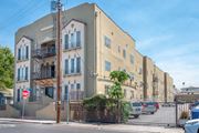 Los Angeles apartment for rent - Front street view of building and parking lot