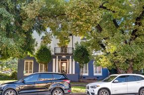 Los Angeles apartment for rent - Two cars parked in front of a house.