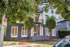 Los Angeles apartment for rent - A blue house with a no parking sign in front.