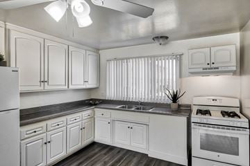 West Covina apartment for rent - the preserve at ballantyne commons apartment kitchen with white cabinets
