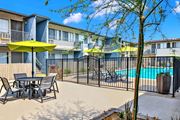 West Covina apartment for rent - our apartments have a pool and a patio with tables and chairs at Sunset Square Apartments, West Covina, California, 91790