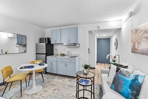 Fayetteville apartment for rent - A modern kitchen with a dining table and chairs.