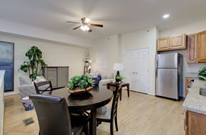 Lynchburg apartment for rent - A modern dining room with a table set for four.
