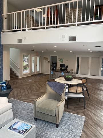 Morrisville apartment for rent - a living room with a table and chairs and a staircase