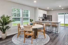 Myrtle Beach apartment for rent - A dining room with a table set for six.