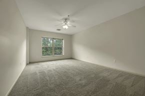 Durham apartment for rent - A room with a carpet floor and a window.