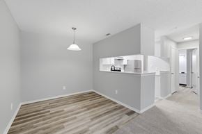 Winston Salem apartment for rent - A room with a wooden floor and a white ceiling.