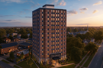 Columbia apartment for rent - The Dylan hotel is a tall building with a parking lot in front.