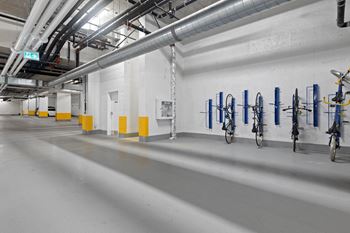 Bike rack stations located at the underground parking structure