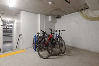 Bike rack stations located at the underground parking structure