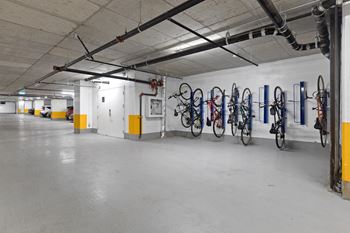Bike rack stations located at the underground parking structure