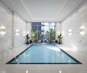 Ottawa apartment for rent - a swimming pool in a room with marble walls - rental amenities