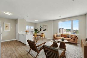 London apartment for rent - A living room with a couch, chairs, and a coffee table.