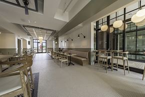 Hickory apartment for rent - a rendering of a restaurant with a long communal table in the middle of the room
