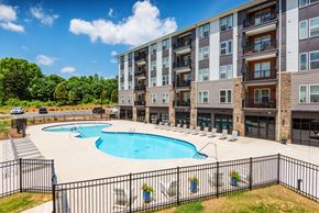 Hickory apartment for rent - our apartments offer a swimming pool and a patio with chairs