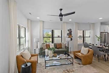 Charlotte townhouse for rent - a living room with couches and chairs and a glass coffee table