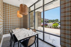 Concord apartment for rent - A dining room with a marble table and chairs.