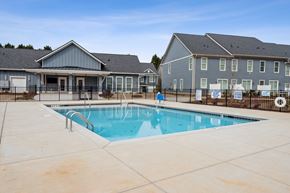 Hickory townhouse for rent - our apartments have a swimming pool with our apartment buildings in the background