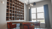 Spartanburg apartment for rent - a room with a table and chairs in front of a bookshelf at The Fitzgerald, Spartanburg, SC, 29302