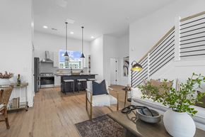 Charlotte townhouse for rent - A modern kitchen with a dining table and chairs.